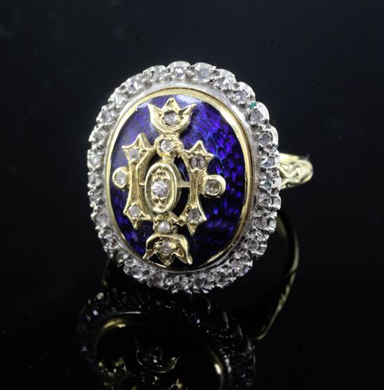 A 1980s George III style 18ct gold, blue enamel and diamond set dress ring, size O.